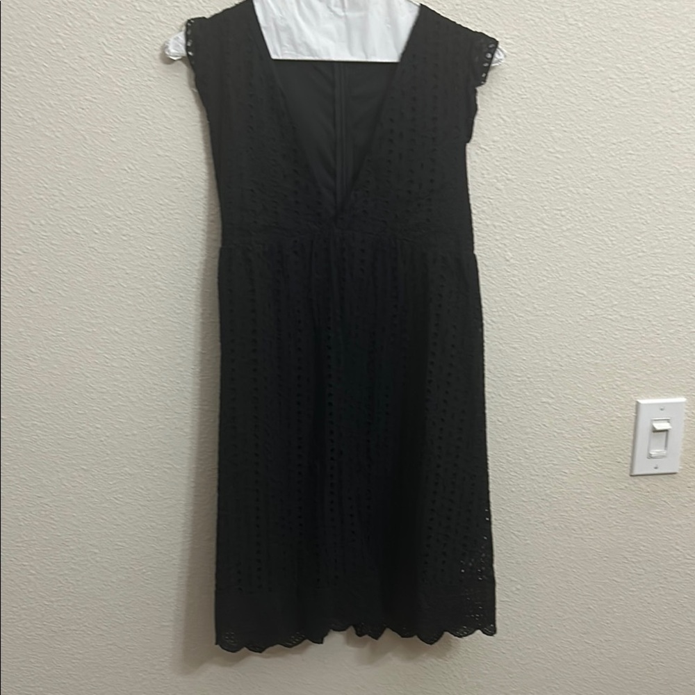 Black eyelet filly lined v-neck dress